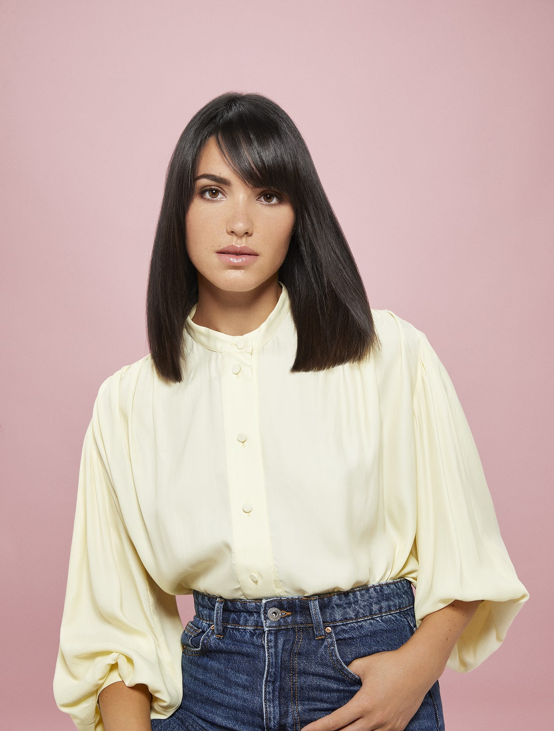 Woman with silky smooth blown out hair