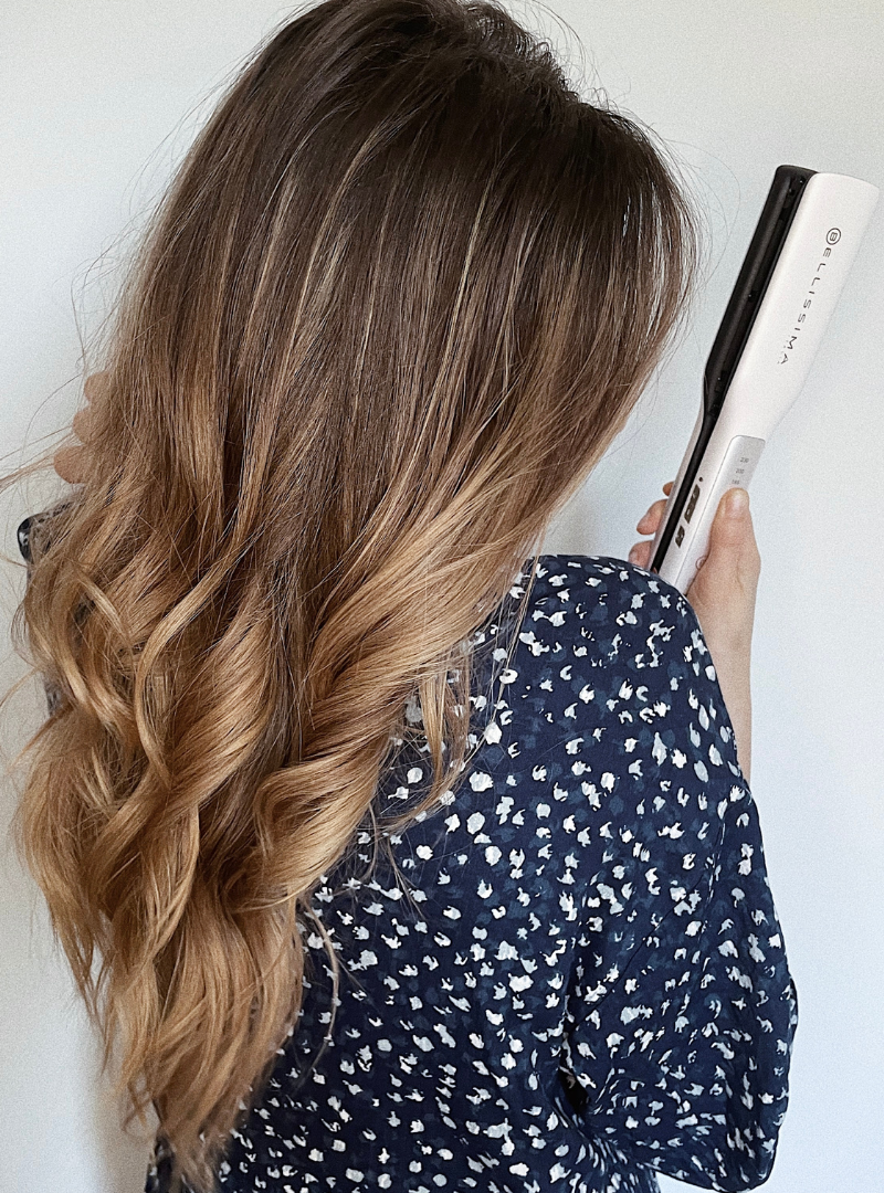 Hair with beach waved achieved using Bellissima Steam Elixir