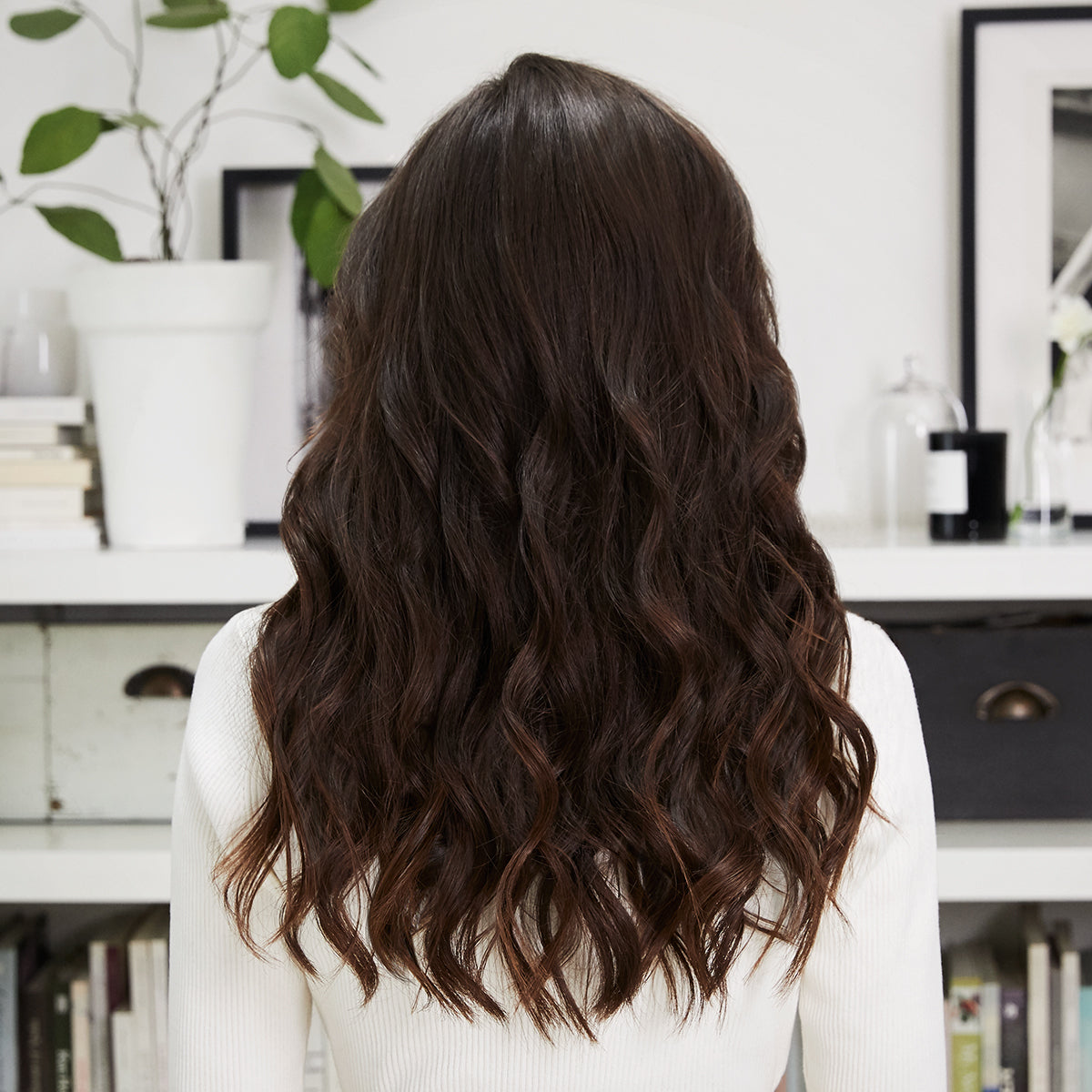 Back view of hair with beach waves using Bellissima Steam Elixir