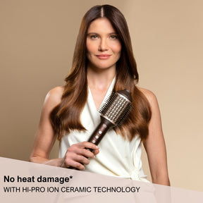 Woman holding the Prodigy Hair Styler with Hi-Pro Ion Ceramic Technology