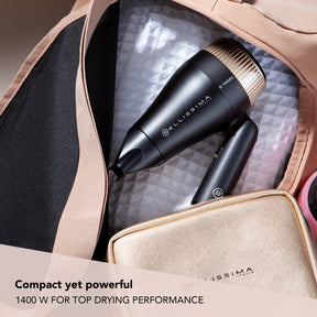 B Travel Hair Dryer in a bag with compact yet powerful caption