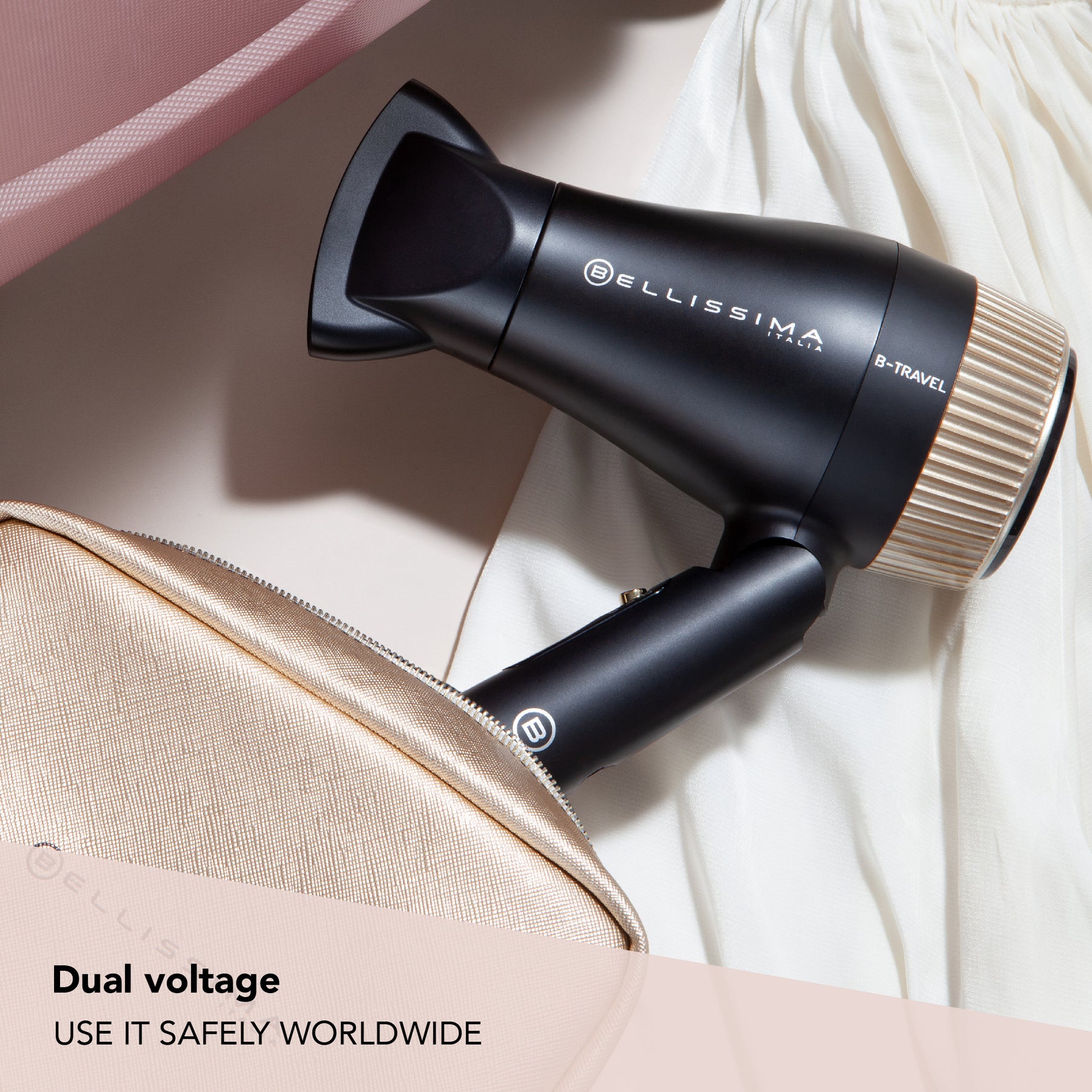 Bellissima B Travel Hair Dryer half folded with dual voltage caption