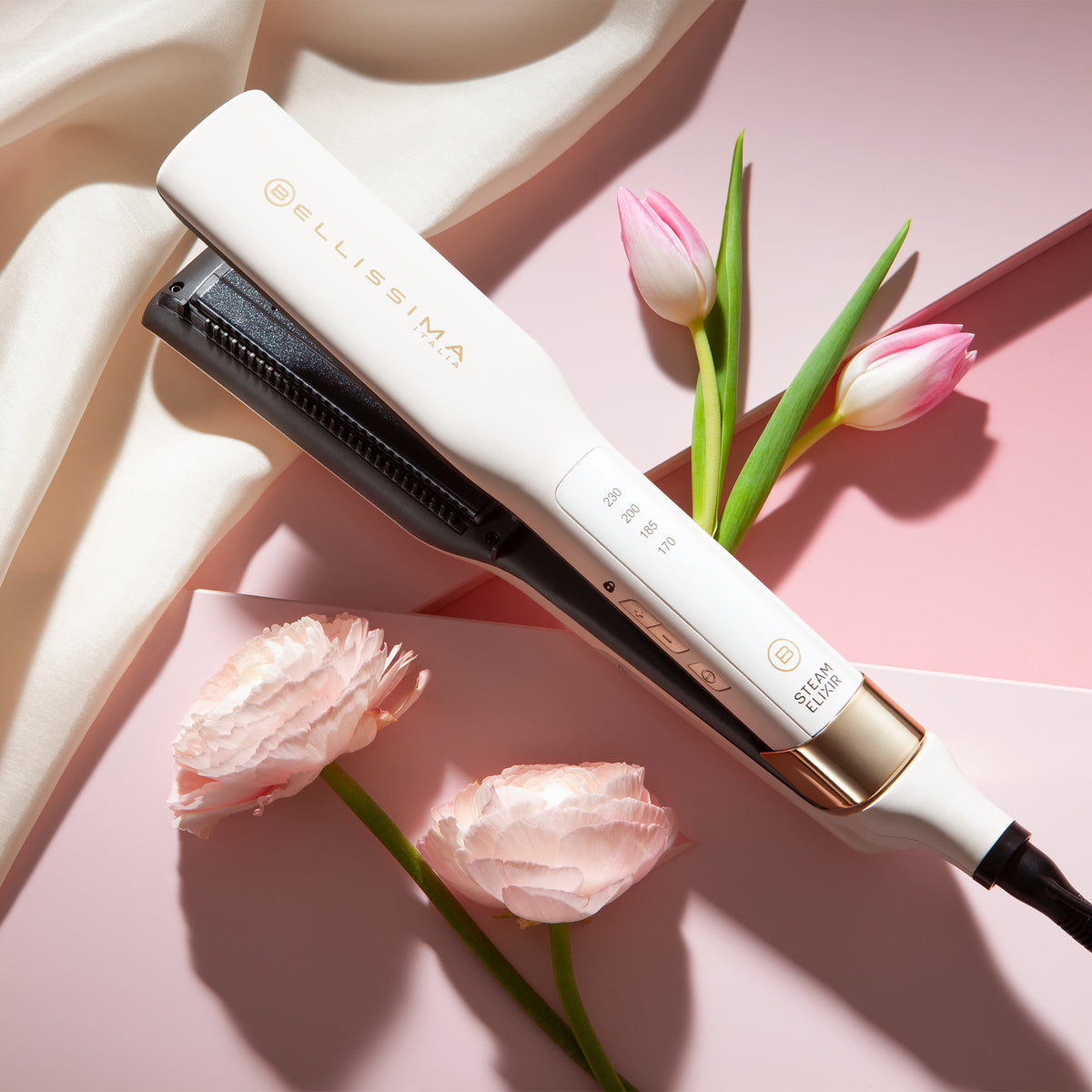 Bellissima Steam Elixir Straighteners with flowers in the background