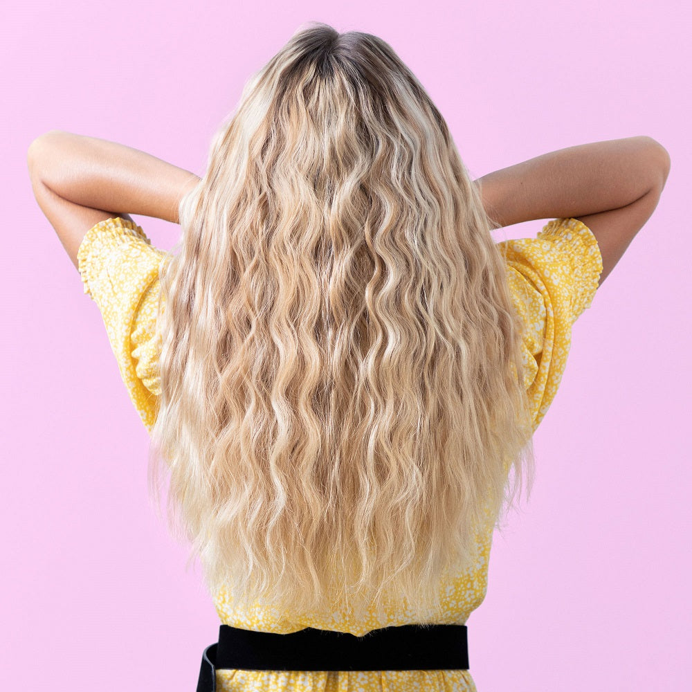 Back view of woman with loose beach wavy hair 