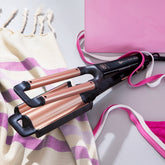 Bellissima Beach Waves Curler against beach items